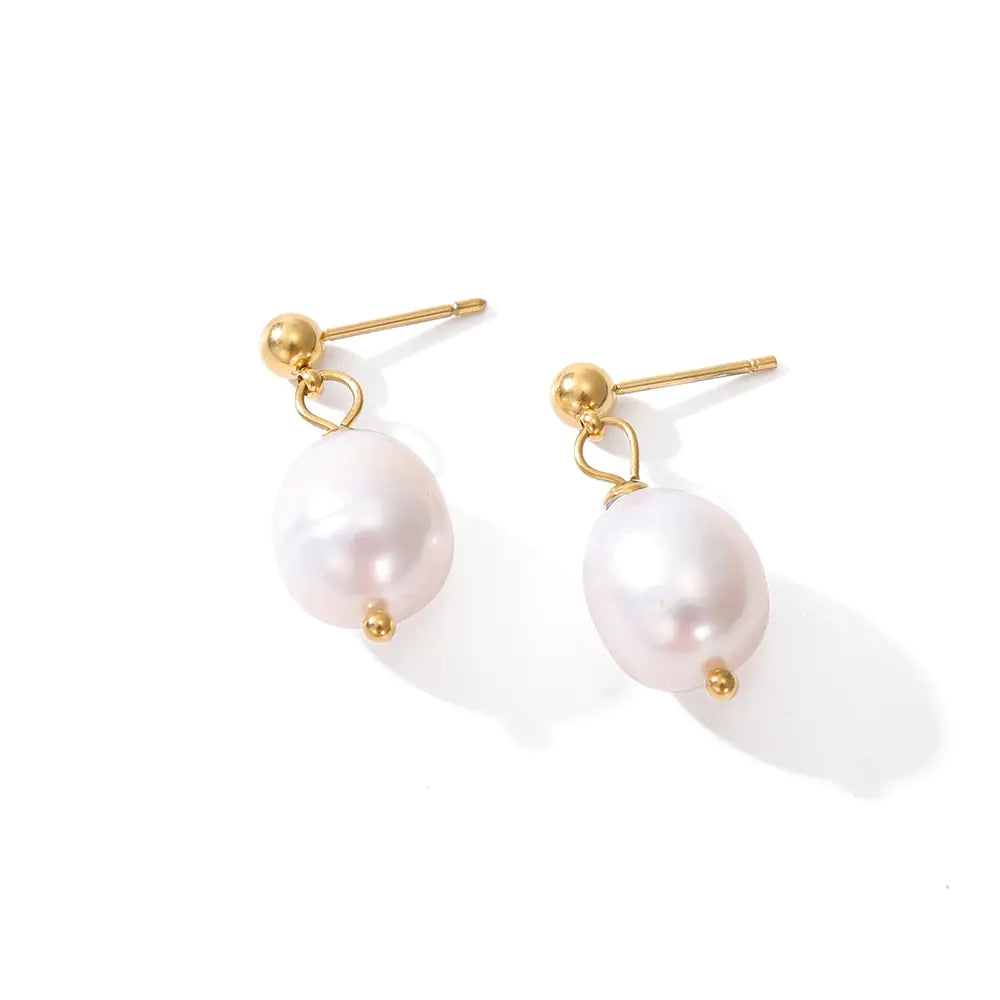 Pendientes colgantes de perlas naturales de agua dulce: elegancia atemporal