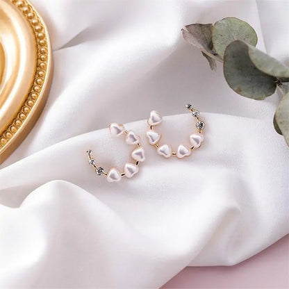 Fashion Heart Pearl Earrings: Timeless Elegance with a Touch of Romance