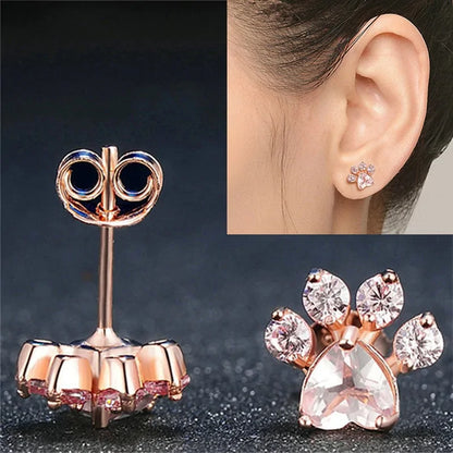 Pendientes de oro rosa con forma de pata: un elegante homenaje a los peludos amigos