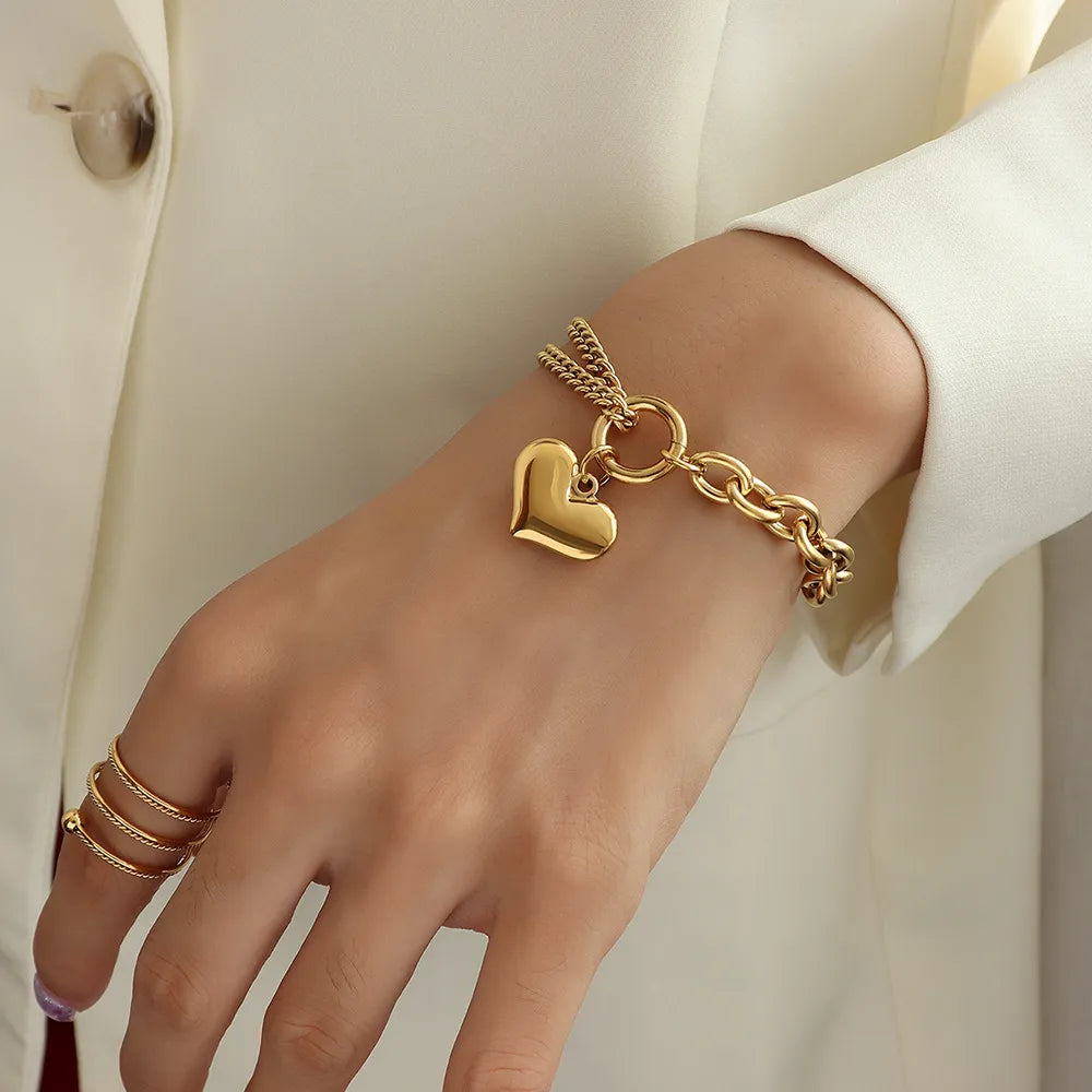 Metallic Heart Pendant Bracelet: Elegance with a Timeless Touch