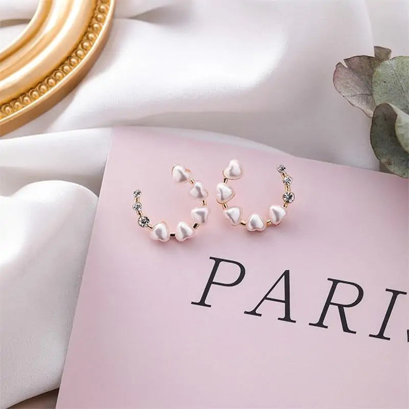 Fashion Heart Pearl Earrings: Timeless Elegance with a Touch of Romance