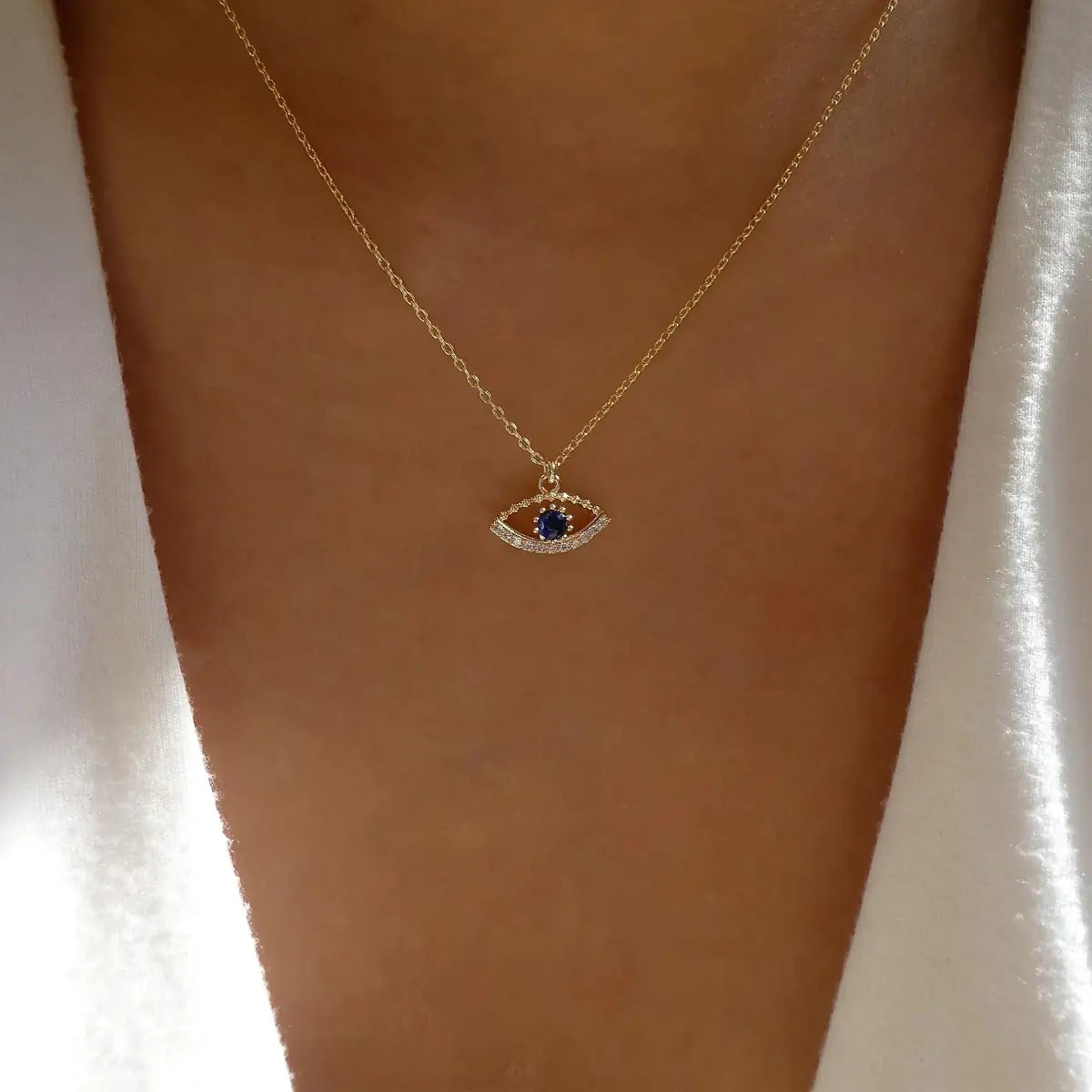 Blue Evil Eye Charm Necklace: A Symbol of Protection and Glamour