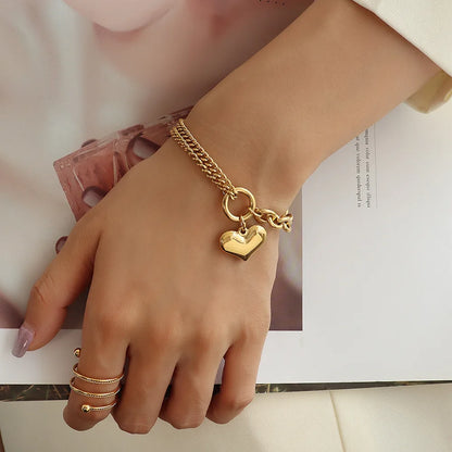 Metallic Heart Pendant Bracelet: Elegance with a Timeless Touch