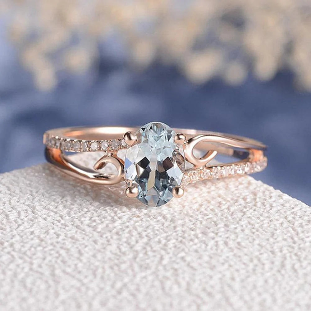 Sky Blue Zircon Crystal Oval Ring: Radiance and Elegance