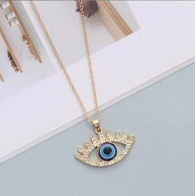 Blue Evil Eye Charm Necklace: A Symbol of Protection and Glamour