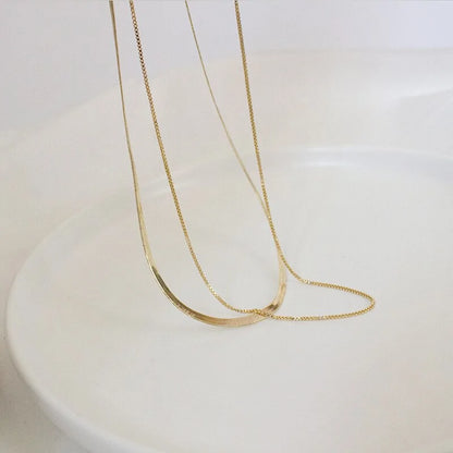 Xarm Snake Chain Necklaces: A Statement of Modern Elegance